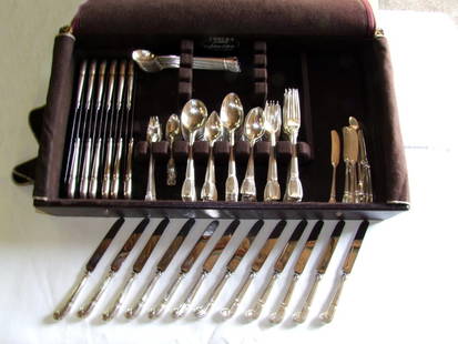 144 Piece Set Of Tiffany "Castilian" Flatware: Art Deco " Castilian" pattern designed by Arthur Leroy Barney, 1929. All pieces except knives, are marked Tiffany & Co. Sterling M. Pat. and only one piece is monogrammed. Set consists of twelve true