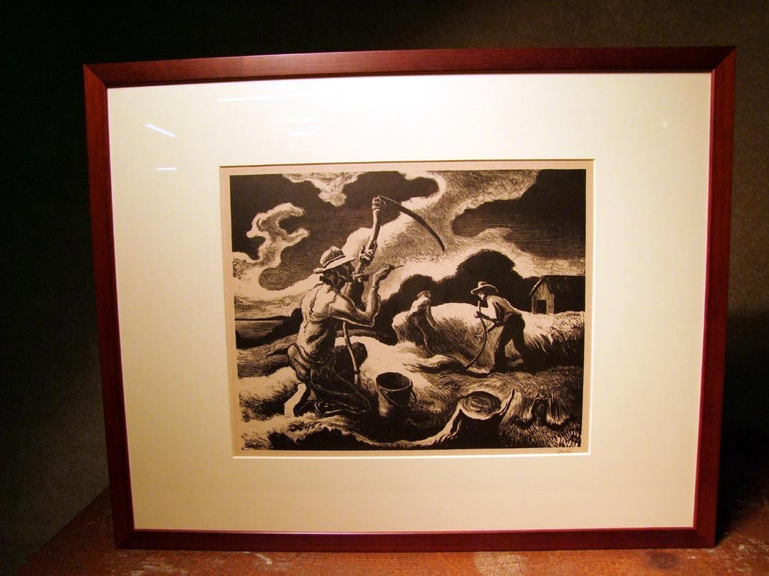 Thomas Hart Benton Print " Island Hay": WPA art of men harvesting a field of hay. Signed in the plate and in pencil. Published by American Artist Assn. in an edition of 250. Opening size: 13 1/4" x 10 1/2". Frame size 23" x 18 1/4" high.