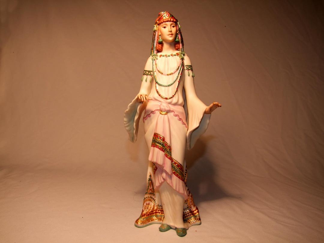 Limited Edition Queen Of Sheba By Cybis: Numbered 111 with a limited edition of 500, dated 1987. Companion to King Solomon, wearing a robe with colorful trimmings and jewelry in her hair. 14" high.