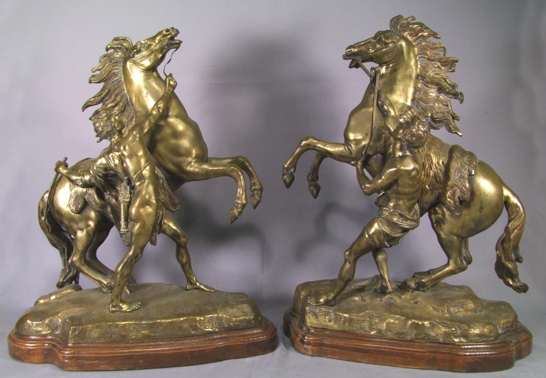 Bronze Marley Horses: Mounted on a wood base that has been drilled for a lamp and does not effect the statues. The lamp parts are included in the lot but not pictured. 19 1/2" high.