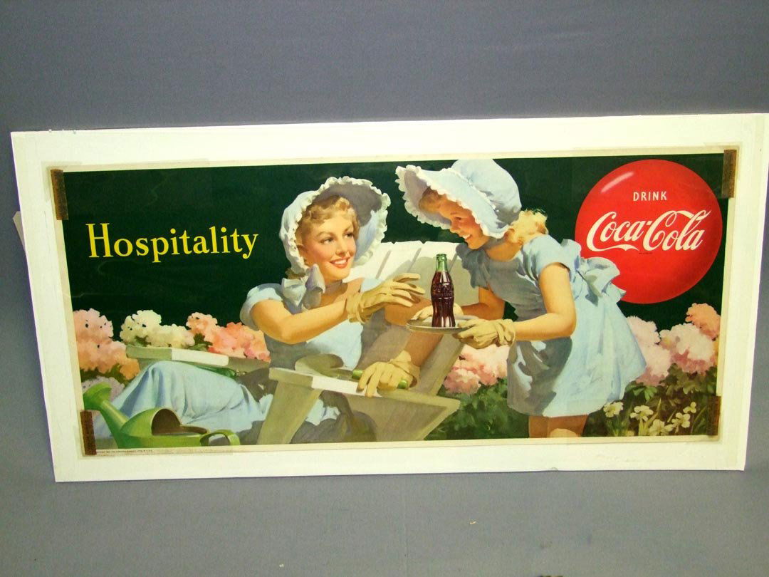 1950 Coca Cola "Hospitality" Sign: Paper window sign with the young girl serving a bottle of Coca Cola to her mother. Published by The Coca Cola Company, Litho, in U.S.A. Crisp colors and edges. 24" x 11". No fold marks.