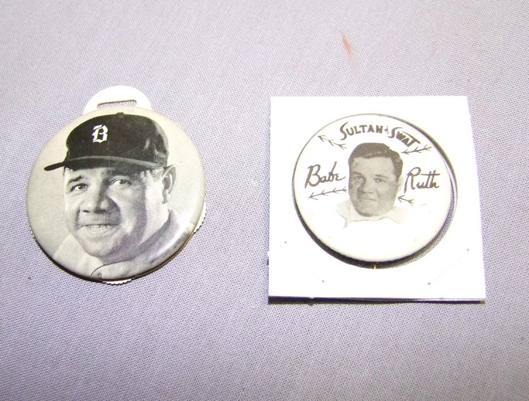 Babe Ruth Pin Back And Score Keeper: The score keeper has a watch fob top made of celluloid with dials to keep score, Babe Ruth image on front. The pin back is Babe Ruth Sultan of Swat. Pin back has oxidation on back and two minor spots 