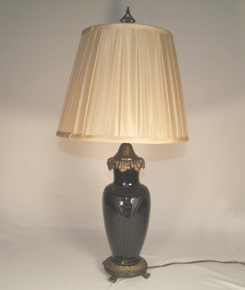 Steuben Acid Cut Back Lamp: Black Steuben lamp with three plain panels separated by a cut back eagle in attack form. 2-light socket, silk shade. 26" high.