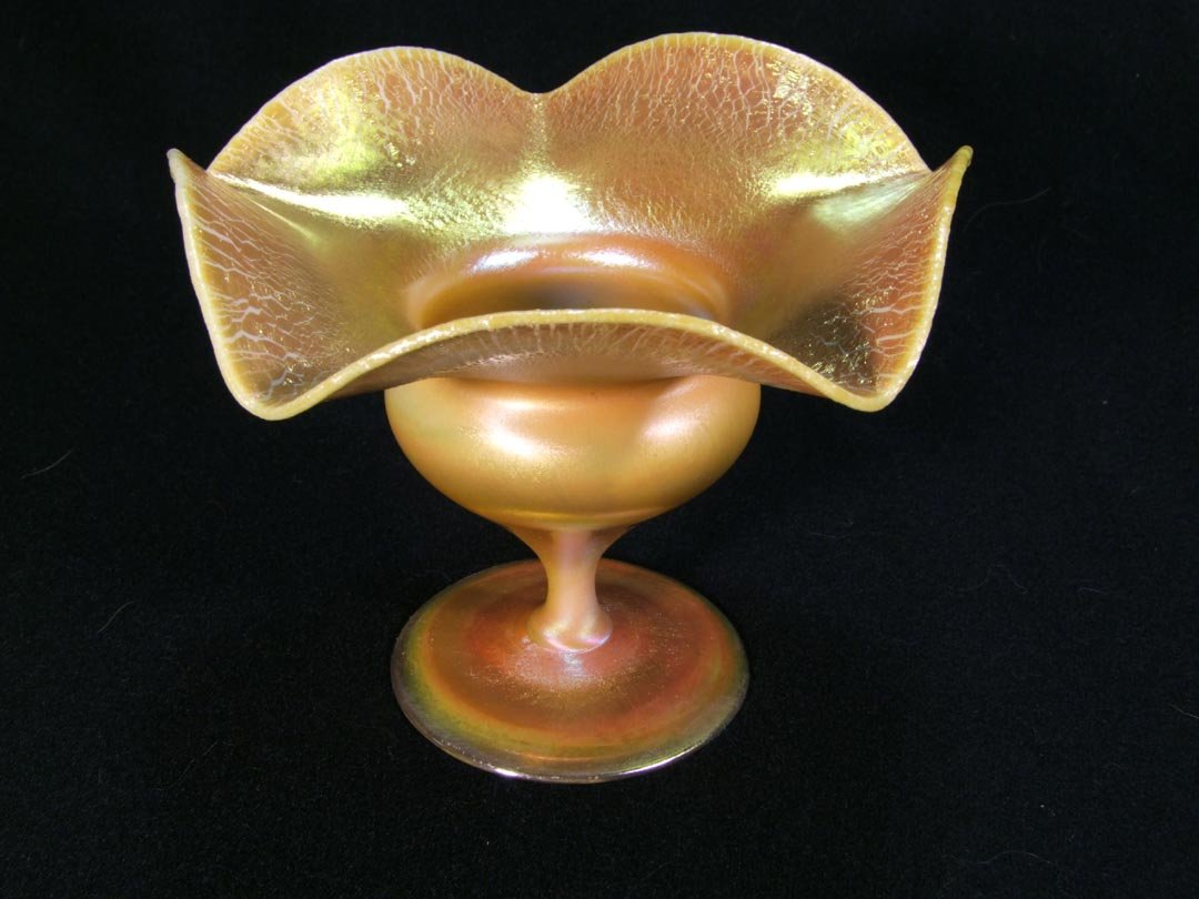 Tiffany Gold Flower Form Vase: Cased gold with exceptional color and iridescence with hints of raspberry and green. White opalescent base glass cased inside and outside with gold iridescence, very unusual. Signed 952L L.C. Tiffany 