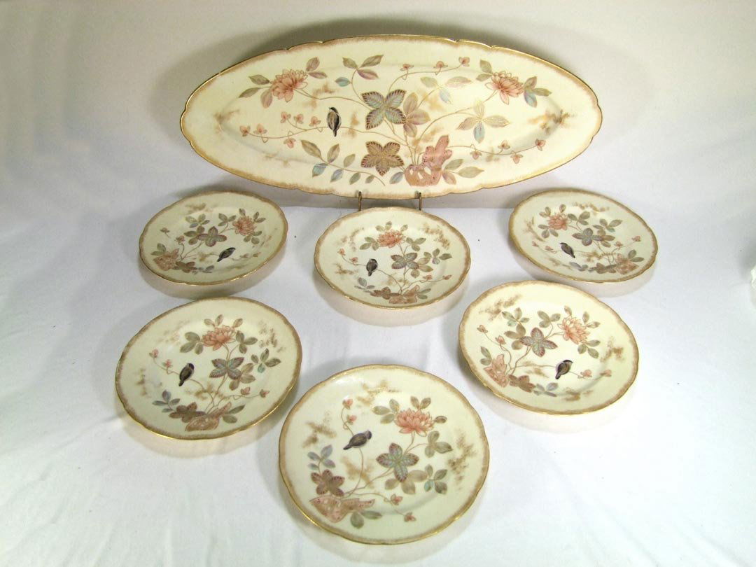 Decorated German Game Set: 19th century game set produced and factory decorated by Schlaggenwald, Germany. 9 1/2" x 24" platter and six 8 1/2" plates. One plate has a very small chip on the edge that has been worn smooth.