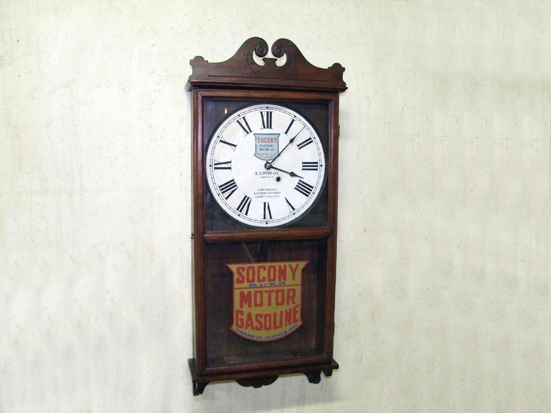 Socony Gasoline And Motor Oil Advertising Clock: Refinished Seth Thomas wall clock with advertising on the face: "Socony, Gasoline, Motor Oil, Standard Oil Co. Of New York. E. Litvin Co., Brooklyn, NY., Cars Greased, Batteries Repaired, Carbon Remov