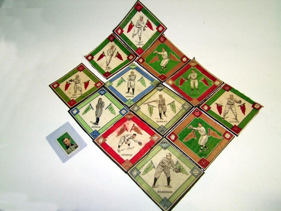 Twelve Baseball Tobacco Felts + Caramels Jennings Card: Twelve felts: Tesreau, Doyle, (2) Boone, Daubert, Demmitt, Perdue, Fletcher, Burns, Gainor, Kavanaugh and McBride with red color runs. All have light stains. Included in lot is a Detroit Tigers Hall o