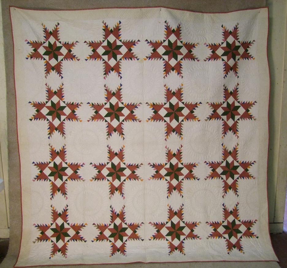Hand Made Quilt: Some of the tightest and even stitches that you can find on a quilt. The overall design on the back is just as attractive as the front. The blocks are joined by hand and only the outside border is don