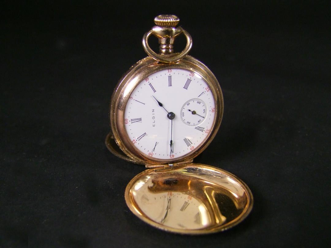 Ladies Pocket Watch: Elgin 7 jewel 20 year case pocket watch with porcelain dial and second hand dial. Monogram BRC. Hunters case with original box. Works.