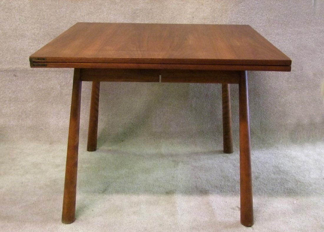 Robsjohn-Gibbings Table: Widdicomb mahogany flip-top dining table designed by T.h. Robsjohn-Gibbings. 38" square top that opens to 38" x 76". Minor scuffs.