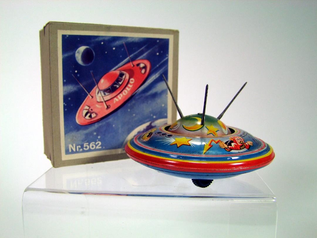 Toy Space Ship: 4" diameter Apollo space ship with 3 flexible antennas. Made in Western Germany with original box. Near mint condition. 1955.