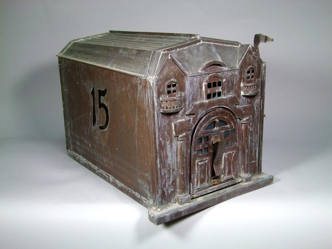 Copper Mail Box: Mail box in the shape of a very impressive home with the front door and windows with balconies. There is a large back door to retrieve your mail and a copper flag that will raise and lower to let the 