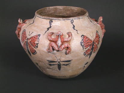 Early Zuni Frog Olla: This masterpiece has four 3-dimentional frogs evenly spaced around the body of the pot and painted butterflies, dragonflies and tadpoles. Excellent condition with minor surface abrasions. 1900 - 1910.