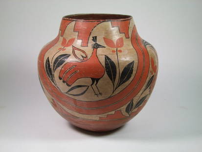 Zia Pueblo Bird Olla: 1890 - 1910 Zia Polychrome Olla with bird and flora design. Good colors of red, black and cream with expected light surface abrasions but no damage or repairs. Large size measuring 14" x 14" high.