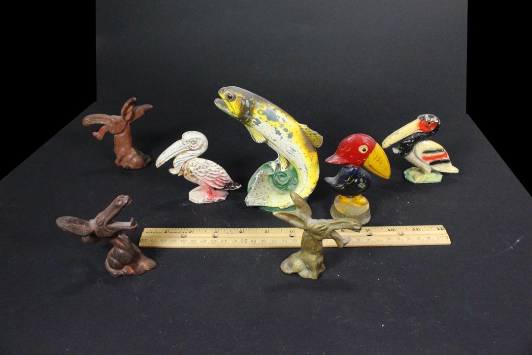 Novelty Bottle Openers: Seven bottle openers: Three birds, three donkeys and table top fish with chips on fins.
