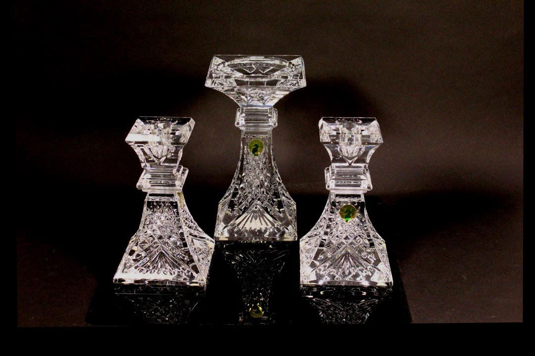 Waterford Unity Set: Three piece set each with the Waterford stamp mark. One pillar stand 7 1/2" high and two 6 1/4" candle sticks. Waterford Heirloom Collection. No damage or wear. Original box is taped.