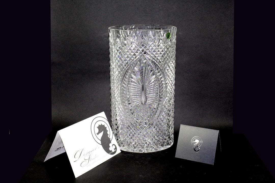 Billy Briggs Waterford Vase: Limited edition of 4/100 by Master Glass Cutter and Designer, Billy Briggs, Waterford Crystal. Has original box and documentation. Waterford stamp mark. 7 1/2" x 5 3/8" x 13 3/4" high. MIB.
