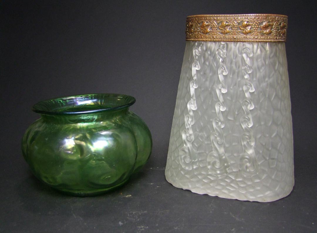 Two Loetz Type Vases: Low green bowl with polished pontil measuring 6 1/2" in diameter x 4" high. Frosted with applied rigoree vase with upper copper band. Both unsigned and in very good condition.