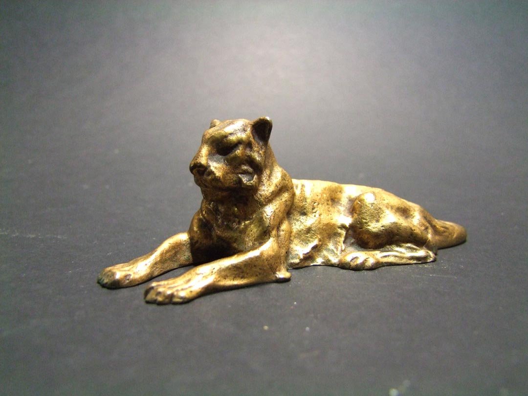 Tiffany Bronze Paperweight: Bronze lion paperweight signed Tiffany Studios, New York, 932. 5" long in very good condition.