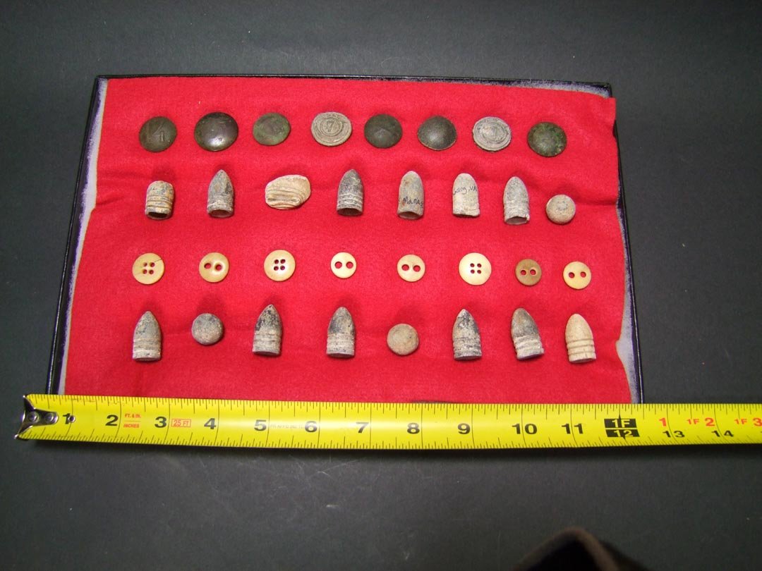 Civil War Buttons, Balls And Caps: 16 buttons, 3 balls, and 12 caps plus one that melted.