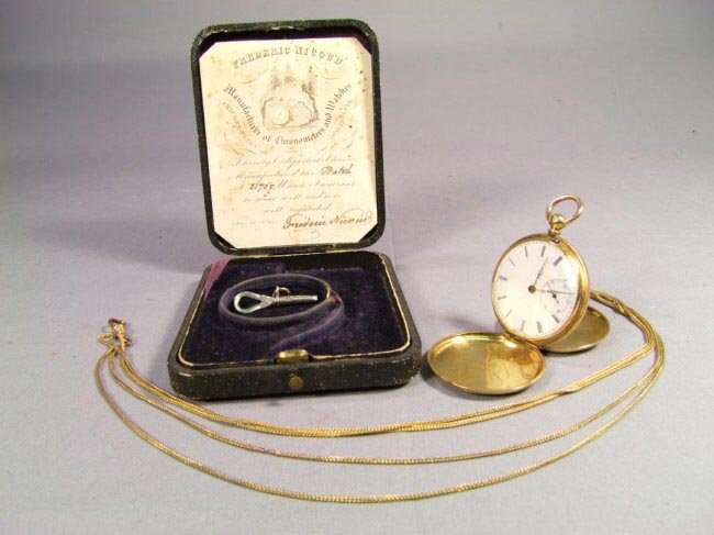 18K Lady's Hunters Case Watch: Key wind watch in working condition by Fredric Nicoud of Chaux-de-Fonds. Marked, Full Jeweled, no. 21767, 18K. Original box with original paperwork signed by Frederic Nicoud. White porcelain dial with