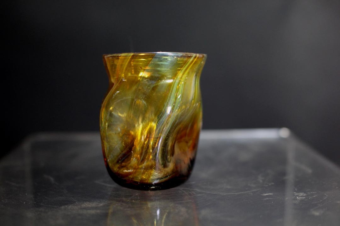 Tiffany Reactive Glass Toothpick Holder: Tiffany reactive art glass toothpick holder with diagonal swirls running through the glass. 1 3/4" high marked 4578. Very good condition.