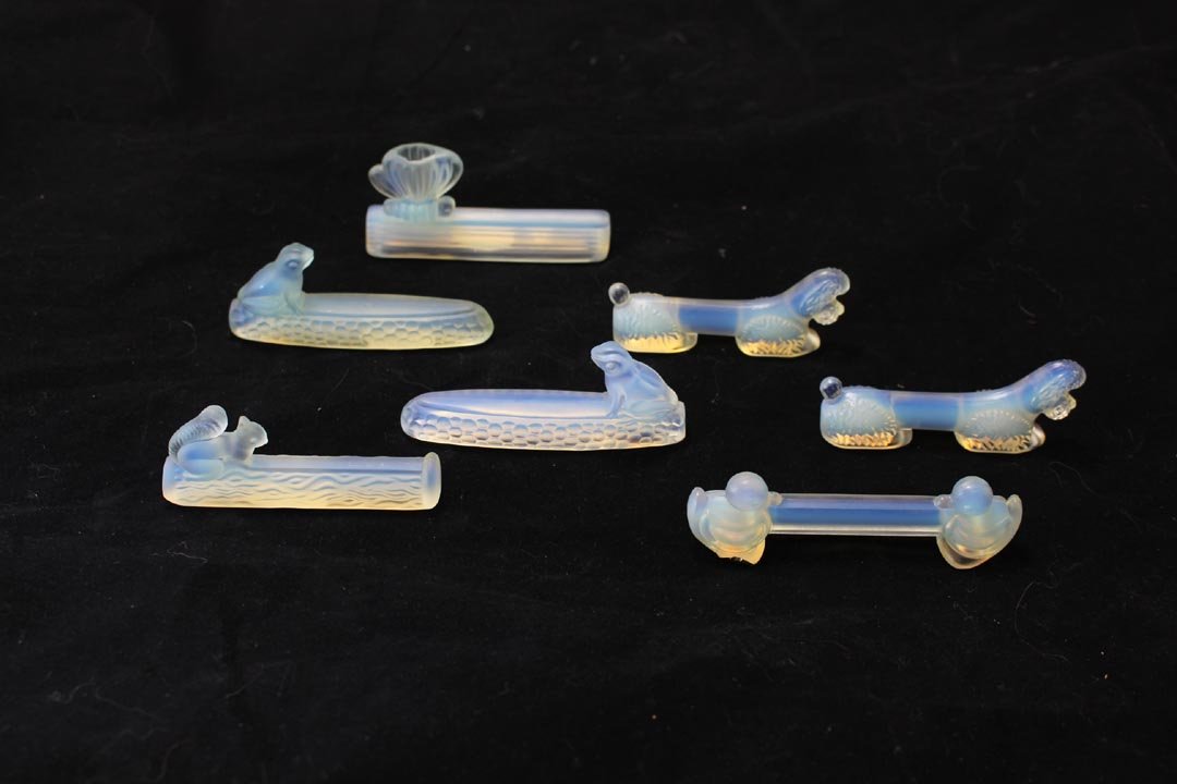 Seven Sabino Knife Rests: A group of seven Sabino knife rests, two poodles, two frogs, one squirrel, one vase and one with ducks. All in very good condition.