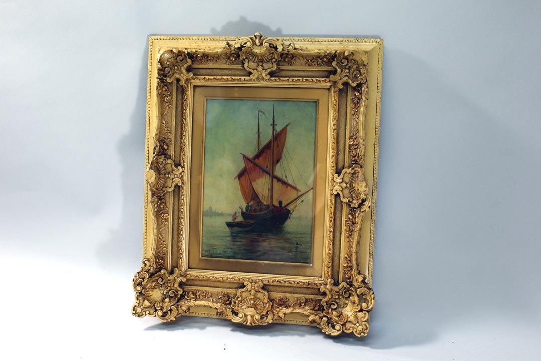 William Henry Hilliard (1836-1905) Oil On Canvas: Oil on canvas signed lower left "WH Hilliard" American artist, with a supply schooner in a harbor showing the coastal buildings in the distance. 7" x 10" in altered frame measuring 14 1/4" x 17 1/4" h