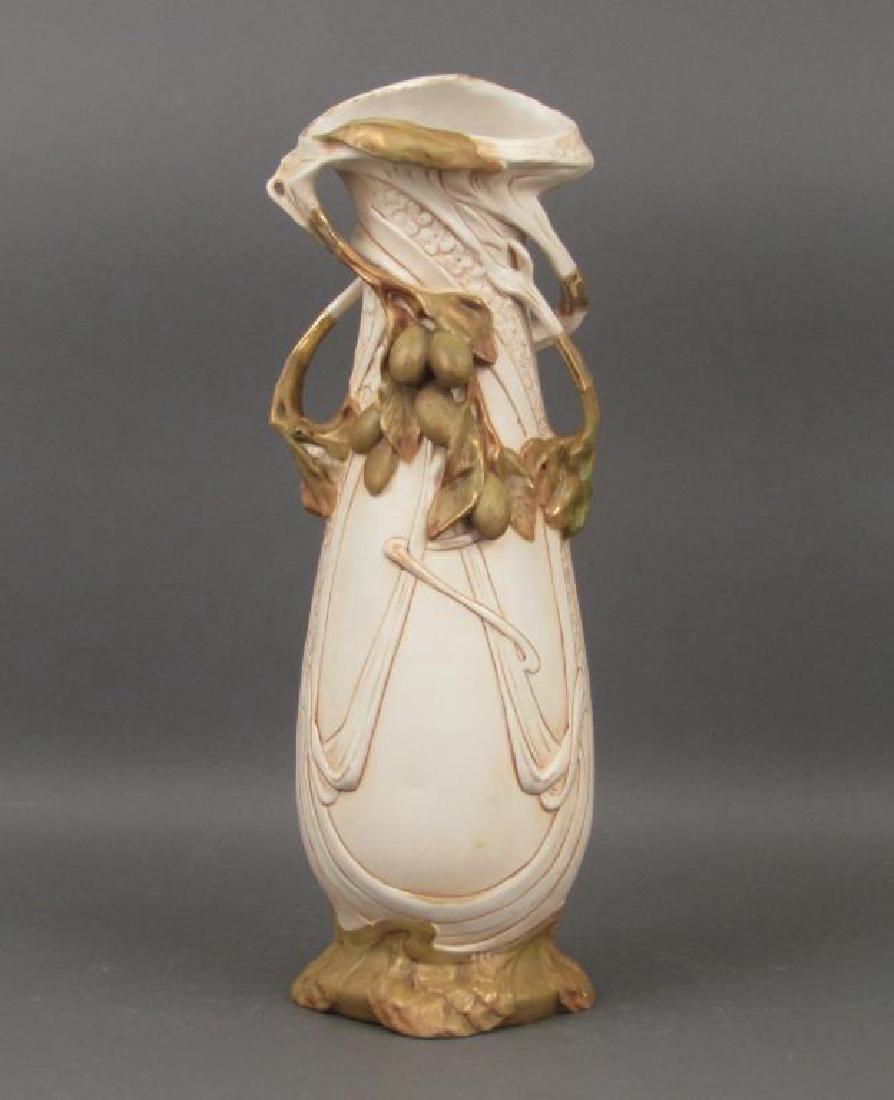 Royal Dux Decorated Porcelain Vase: Gilt accents with raised flower and line design. Triangle on base. 19.5H"