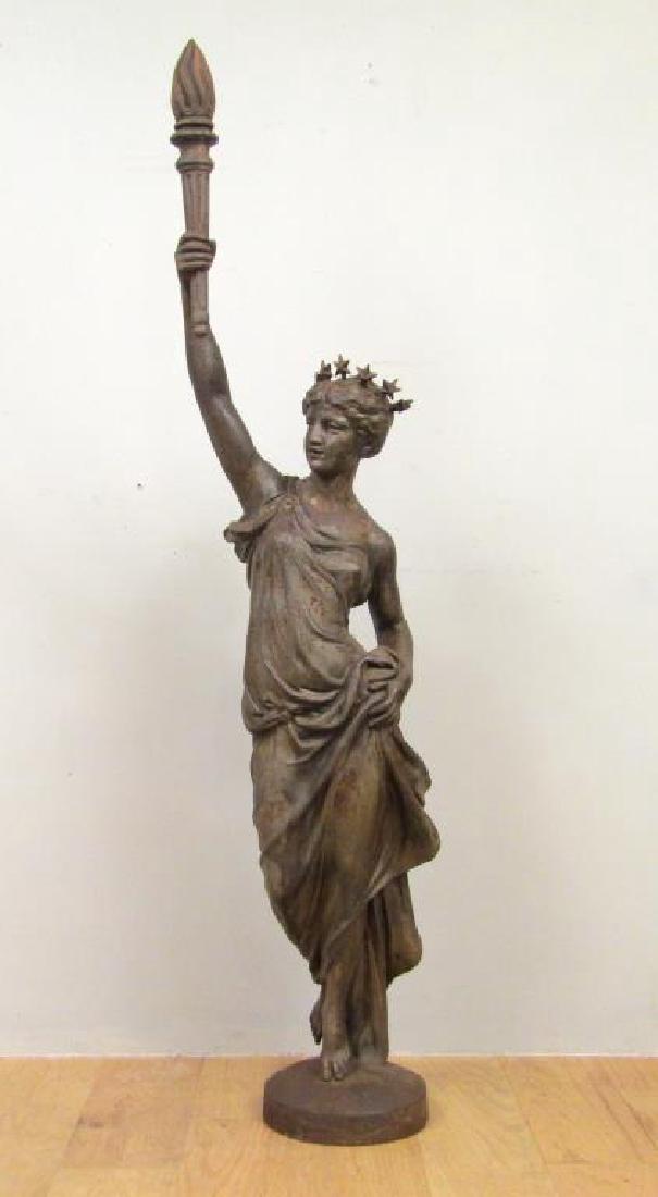 Vintage Cast Iron Lady Liberty: 7 star crown, upholding torch in classical robe. Signed E. Capitain. Geny & Cie. Bussy and Marne. 55.5H. (From a 655 Park Avenue Triplex)"