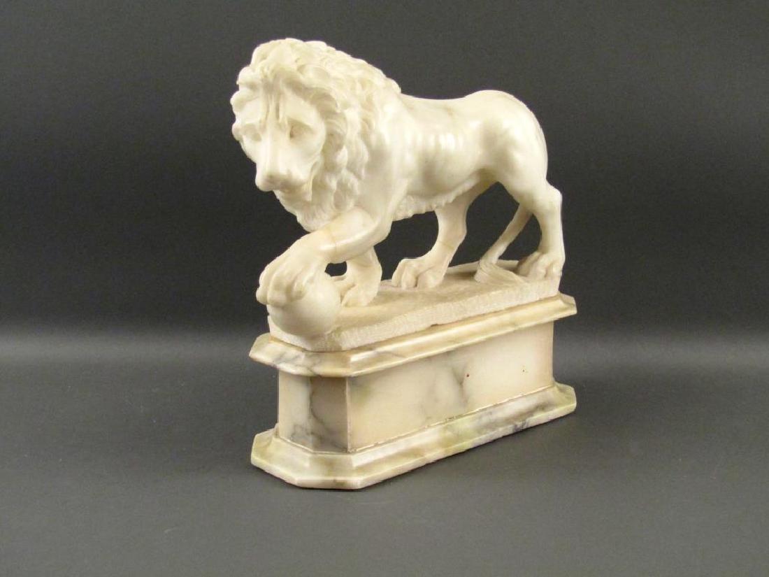 Carved Alabaster "Library" Lion: On alabaster plinth base. Repairs. 12"W X 5"D X 11"H