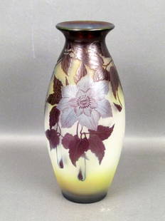 Emile Galle Cameo Glass Vase: Purple vines in bloom with bell flowers on faintly iridescent yellow and white base cameo. Wheel carved and fire polished. Signed in glass. 6.5Dia. X 12"H. Circa 1900 Leo Kaplan Receipt. (Upper East S