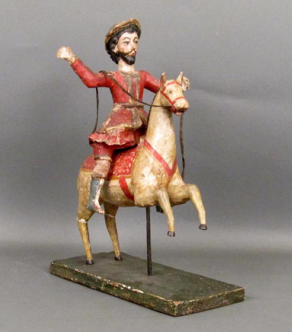 Antique Painted Wood Man on Horse (as is): Man (removable) on horse, with thin straps. Possibly Don Quixote. Repairs. As is. Rustic / Arts & Crafts / Primitive Manner. 13long X 16"H. (From a 655 Park Avenue Triplex)"