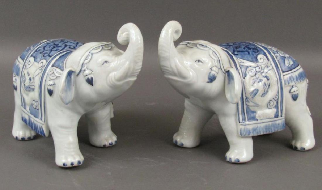 Pair Japanese Porcelain Elephants: Raised trunks with intricate caparison. Manufactured for Lord and Taylor. 9long X 7"H"