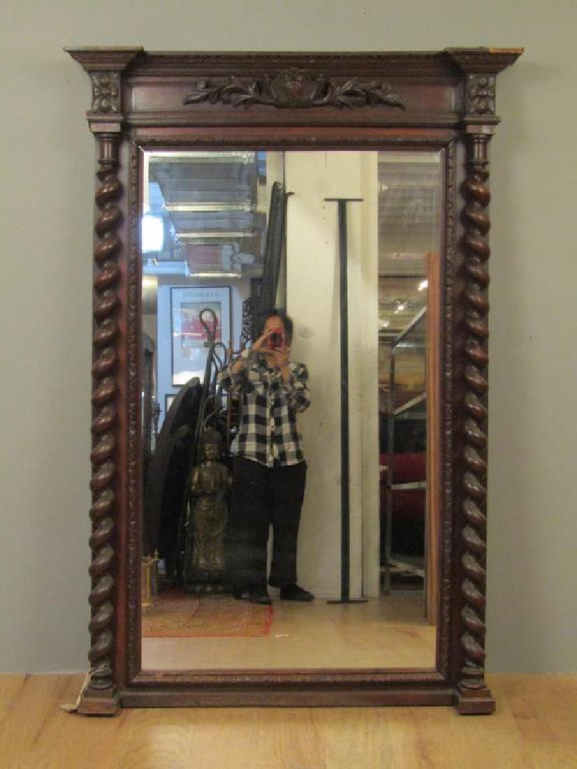 Antique English Columnar Pier Mirror: Carved frieze over twist columns. As is. 42" X 62.5"