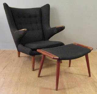 Hans Wegner Papa Bear Chair and Ottoman: Classic style with Danish control furniture makers' label on both. Seat straps need restoration, fabric slightly soiled. 36"W X 35"D X 39"H. Ottoman: 28"W X 16"D X 16"H.