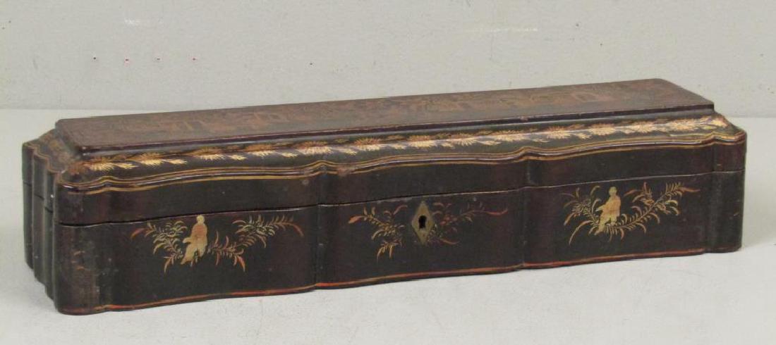 Antique Chinese Glove Box: Lacquered and gilt with figures on lid. Painted paper decoration and satin lining. 16"W X 4.5"D X 3.5"H