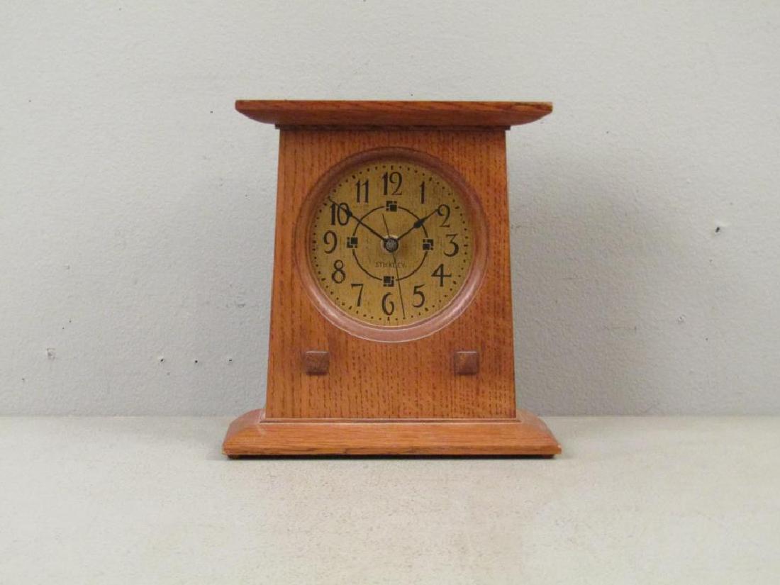 Stickley Oak Mantel Clock: Angled body. Battery operated. 8"W X 2.5"D X 9"H