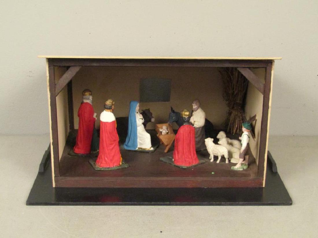 American Nativity Scene Model: Painted wood barn and figures. 17"W X 15"D X 9.5"H. (From the Newark Museum, NJ.)