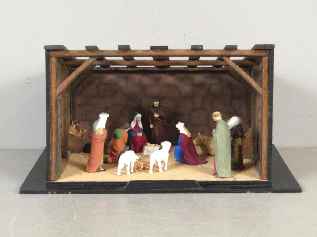 Italian Nativity Model: Painted wood barn and figures. 17"W X 12.5"D X 9"H. (From the Newark Museum, NJ.)