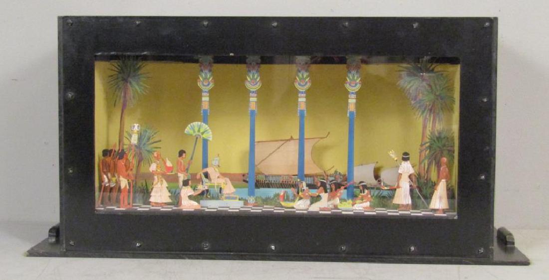 Ancient Egyptian Model: Painted cardboard cutout figures. Painted background. 11"W X 26.5"D X 15"H. (From the Newark Museum, NJ.)