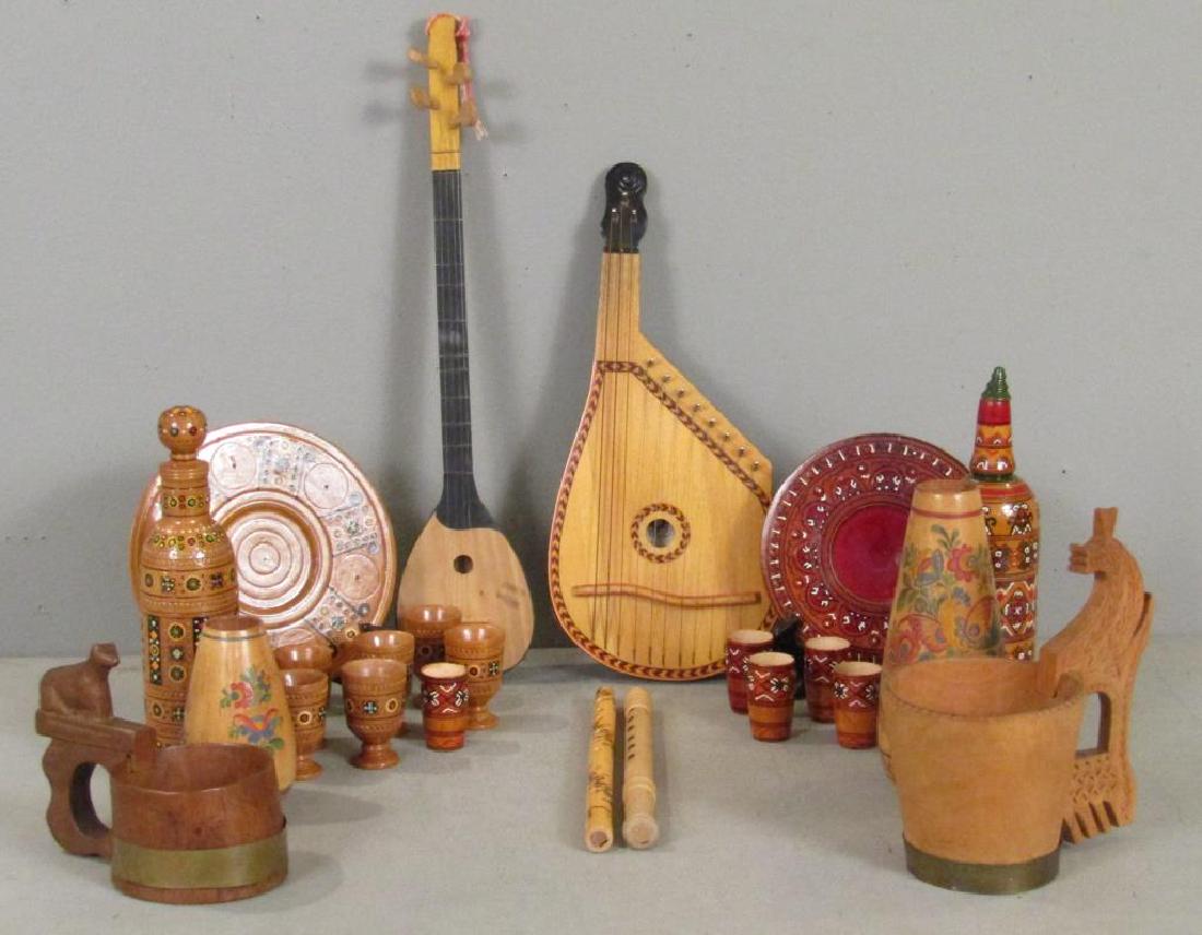 Eastern European Painted Wood Articles: Czech whey bowl, set of two vases, flute, and dipper. Ukrainian cordial set, and wine set. Two Yugoslavian stringed instruments (longest: 19"). Romanian flute. (From the Newark Museum, NJ.)