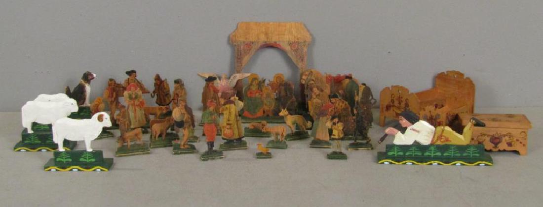 Czechoslovakian Painted Wood Figures: Painted dog, lambs, duck, and male figure. Thin painted wood figures (including Nativity scene). Painted doll house furniture. (From the Newark Museum, NJ.)