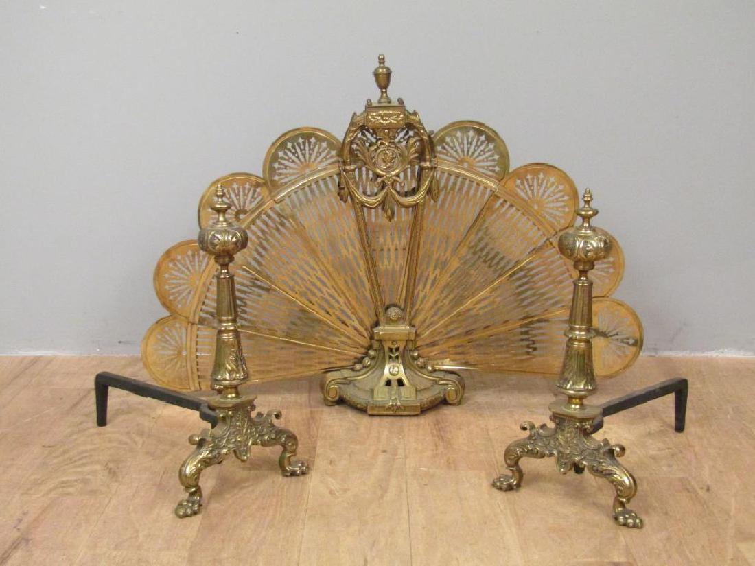 Fan Fireplace Screen and Andirons: Andirons with acanthus leaf designs and paw feet. (andiron on right loose). Screen with Queen Victoria medallion. Andirons: 10"W X 17"D X 19.5"H. Screen: 29.5"H.