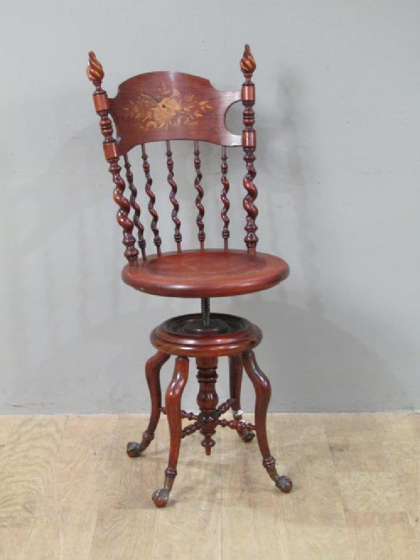 Victorian Mahogany Swivel Piano Chair: Marquetry inlaid and twist post back. On ball and claw feet (one with repair). 18"W X 20"D X 43.5"H