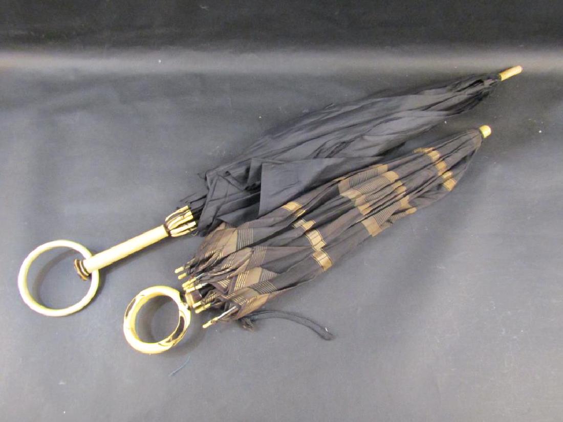 2 Celluloid Mounted Umbrellas Parasols: Mounts in good condition. Umbrellas as is. Longer: 31"