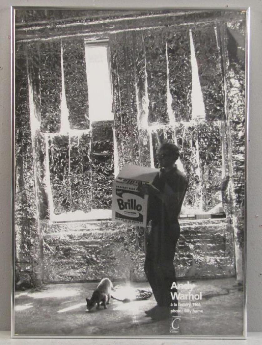 Poster from Photograph by Billy Name: Warhol holding a Brillo box with cat. Signed on verso. 28" X 20"
