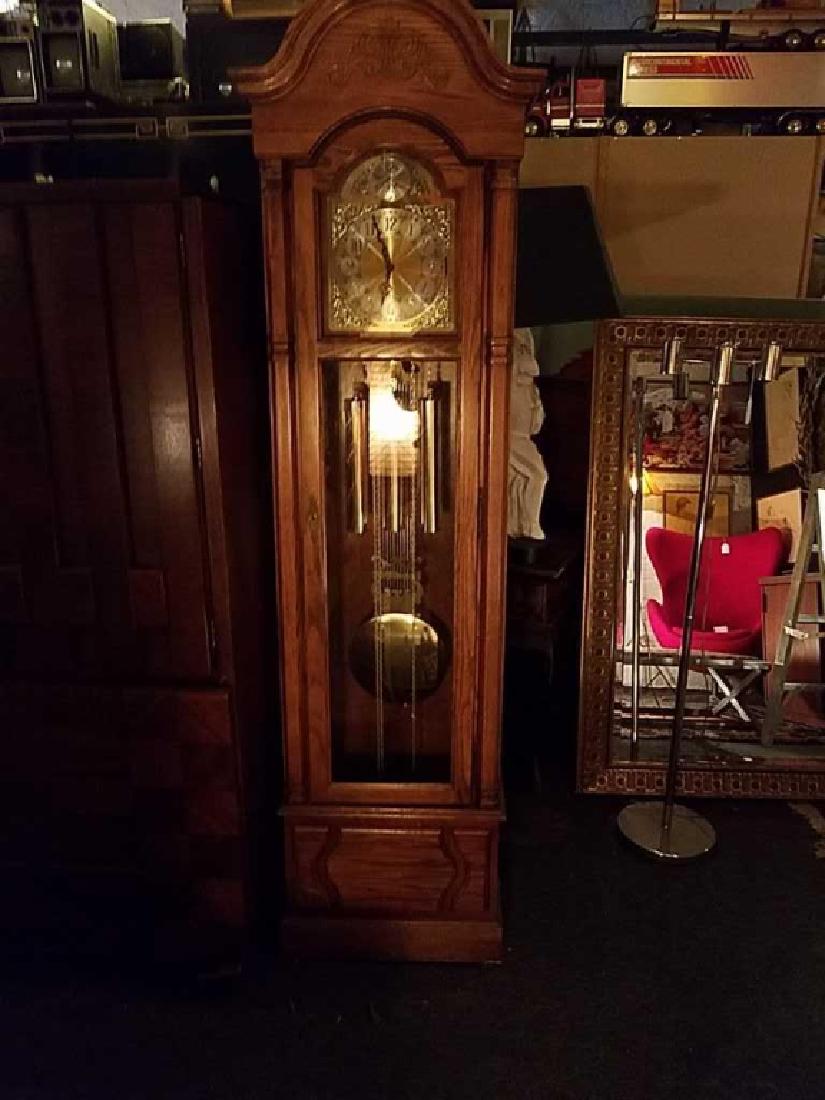Howard Miller Tall Case Clock: Tempus Fugit Metal face, weights and pendulum