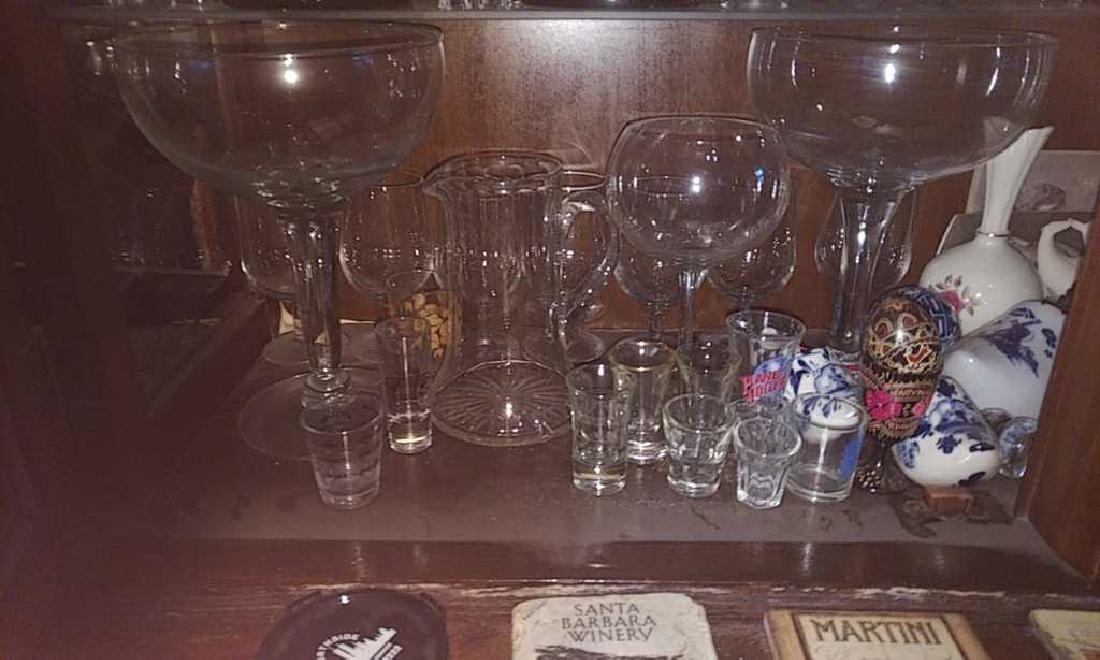 Shelf of Assorted Barware and Glassware.: (Large "Martini Glasses" not included)