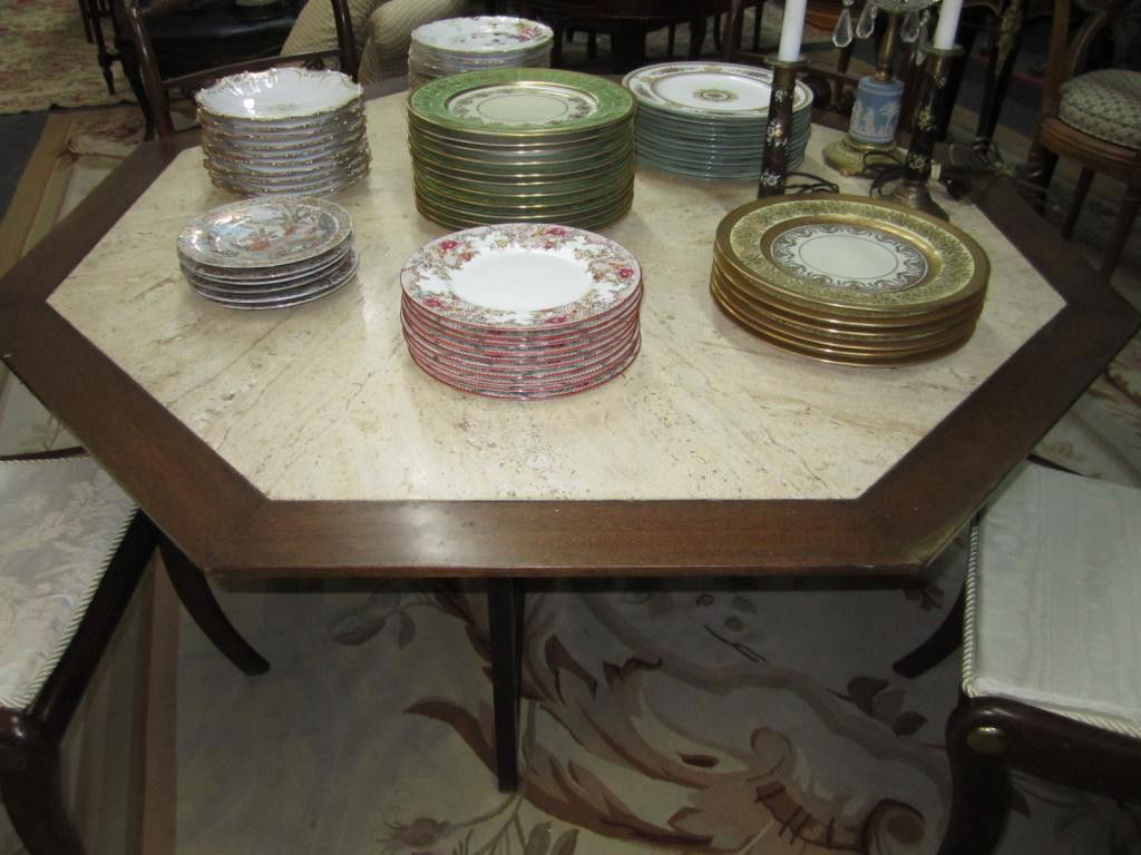 Mid-Century Octagonal Dining Table: with an inset travertine top and a sculpted "X" frame base.